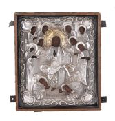 A mid 19th century Russian icon of Christ in Majesty in a silver parcel gilt oklad