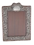 An Art Nouveau silver photograph frame by Henry Matthews