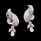 A pair of diamond ear pendants