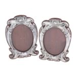 A pair of Arts and Crafts silver photograph frames by J. Aitkin & Son