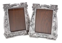 A pair of Arts and Crafts silver photograph frames by Charles S. Green & Co.