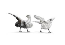 A pair of Continental silver pheasant table ornaments