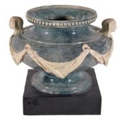 A Wedgwood & Bentley 'Queen's Ware' Egyptian taste two-handled urn and black basalt base