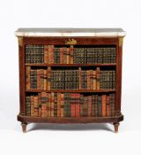 A pair of French mahogany and gilt metal mounted open bookcases