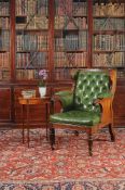 A George IV mahogany and button upholstered library armchair