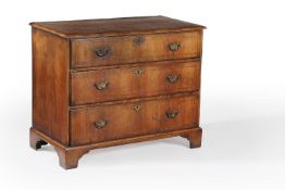 A George II walnut chest of drawers