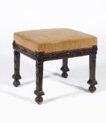 A George III mahogany and upholstered stool