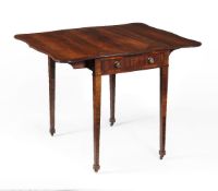 A Regency goncalo alves 'butterfly' Pembroke table