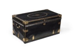 A Chinese export leather and brass studded trunk