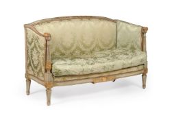 A French green painted and parcel gilt carved wood three piece suite of seat furniture