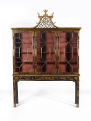 A black lacquer and gilt chinoiserie decorated cabinet in George III style