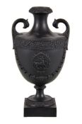 A Neale & Co. black basalt two-handled urn