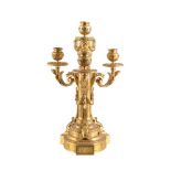 A Louis XVI gilt bronze three light and cassolette candelabrum