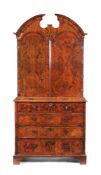 A George I walnut and featherbanded secretaire cabinet