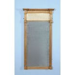 A Regency giltwood, composition and verre englomise wall mirror