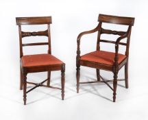 A set of twelve George III mahogany dining chairs