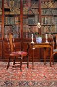 A George II walnut and featherbanded concertina action card table