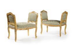 A pair of giltwood and upholstered window seats