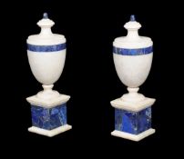 A pair of white marble and lapis lazuli mounted urns in Neoclassical style