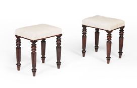 A pair of George IV mahogany and upholstered stools