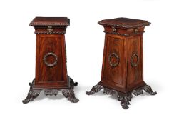 A pair of Regency mahogany pedestals