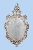 A cream painted carved wood wall mirror in George III style