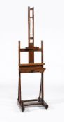 An oak height adjustable artist's easel by WINSOR & NEWTON