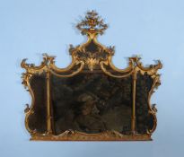 A carved giltwood wall mirror