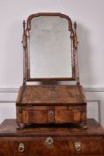 A Queen Anne walnut dressing mirror