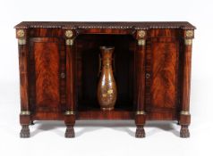 A George IV Irish figured mahogany and gilt metal mounted breakfront side cabinet