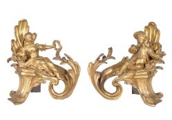 A pair of Louis XV ormolu figural chenets