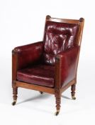 A William IV mahogany and buttoned leather upholstered library chair