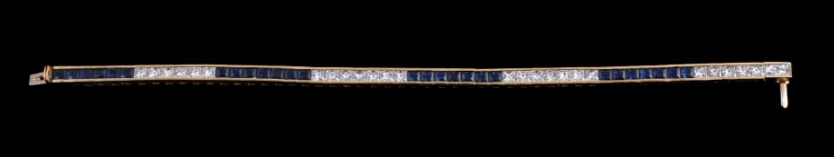 A diamond and sapphire line bracelet