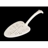 A Wedgwood 'Queen's Ware' pierced fish slice, circa 1780, of leaf-shaped form with foliate handle,