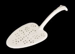A Wedgwood 'Queen's Ware' pierced fish slice, circa 1780, of leaf-shaped form with foliate handle,