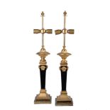 Gianni Versace for Versace Home, a pair of Tronco di Piramide ebonised wood composition and gilt
