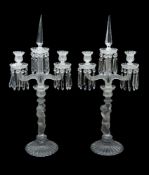 Baccarat, a pair of moulded glass two branch figural candelabra, 20th century, the campana shaped