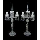 Baccarat, a pair of moulded glass two branch figural candelabra, 20th century, the campana shaped