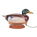 Alan Emmett (1938-2008); a modern carved and painted wood model of a duck decoy, the keel with