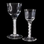 Two opaque-twist wine glasses, circa 1760, each with an ogee bowl supported on a double-series