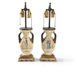 A pair of French metal mounted ceramic Japonisme table lamps, circa 1880, the bodies modelled as