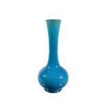 A Burmantofts Faience tall bottle vase, circa 1890, turquoise glazed overall, impressed mark, no.