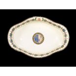 A Turner creamware crested and armorial quatrefoil bowl, late 18th century, decorated with a