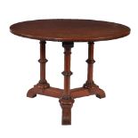 A Reformed Gothic mahogany and parcel ebonised centre table by Holland & Sons, late 19th century,