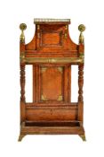 A Victorian oak and brass mounted hall stand, circa 1890, in Aesthetic taste, following a design