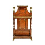 A Victorian oak and brass mounted hall stand, circa 1890, in Aesthetic taste, following a design