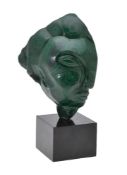 A malachite stylized bust, unsigned, late 20th century, probably Zimbabwe, on a black hardstone