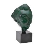 A malachite stylized bust, unsigned, late 20th century, probably Zimbabwe, on a black hardstone