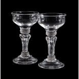 A pair of sweetmeat glasses, circa 1900, the ogee bowls supported on a 'Silesian' stem and a domed