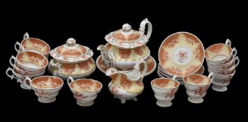 A Ridgway porcelain 'Rococo revival' part tea service, circa 1840, printed in iron-red with birds